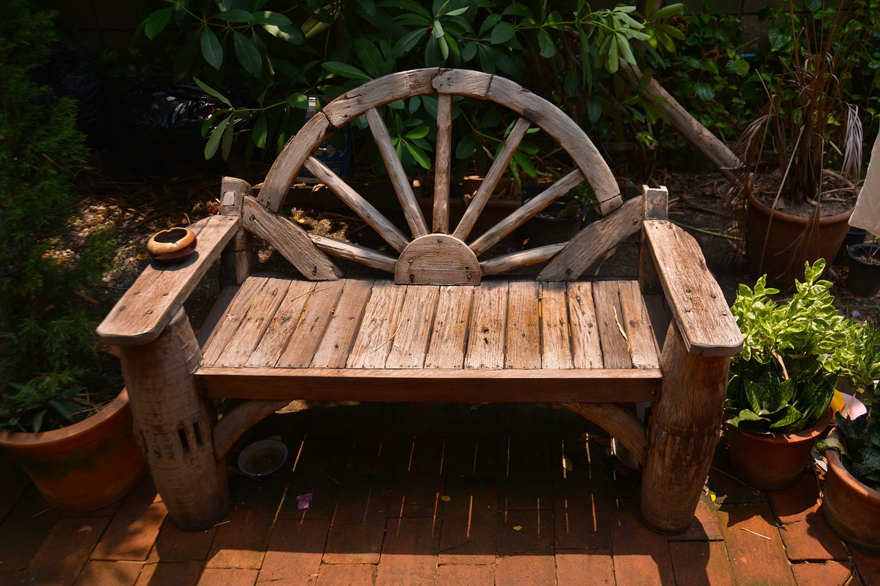 A wooden bench in a garden